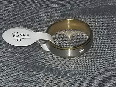 Silver band with stone in the middle